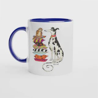 White mug with blue handle and blue interior, featuring cat and spotted dog illustration