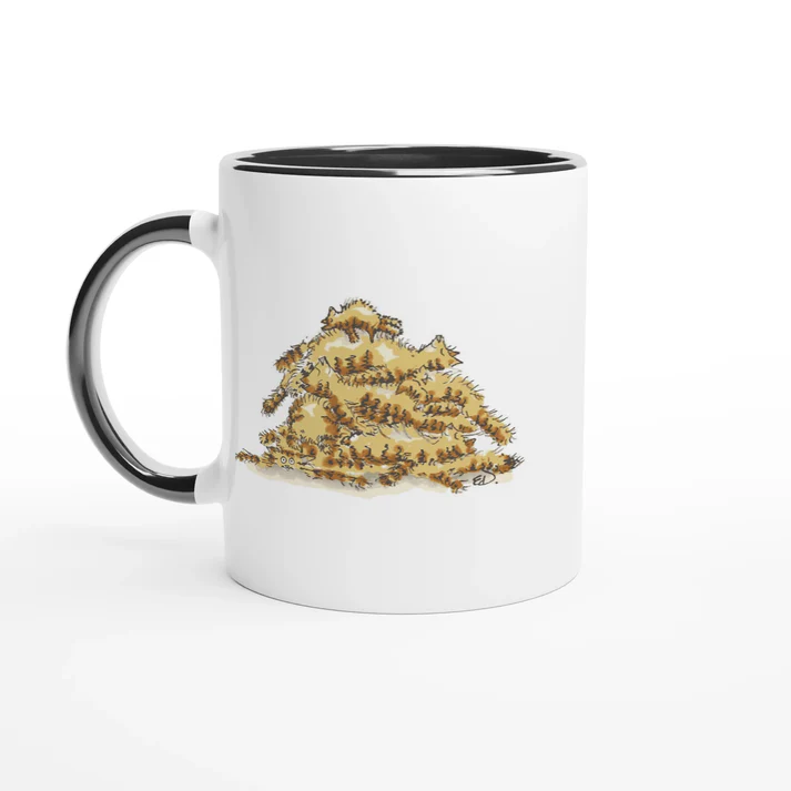 White mug with a pile of cats illustration and black handle and interior