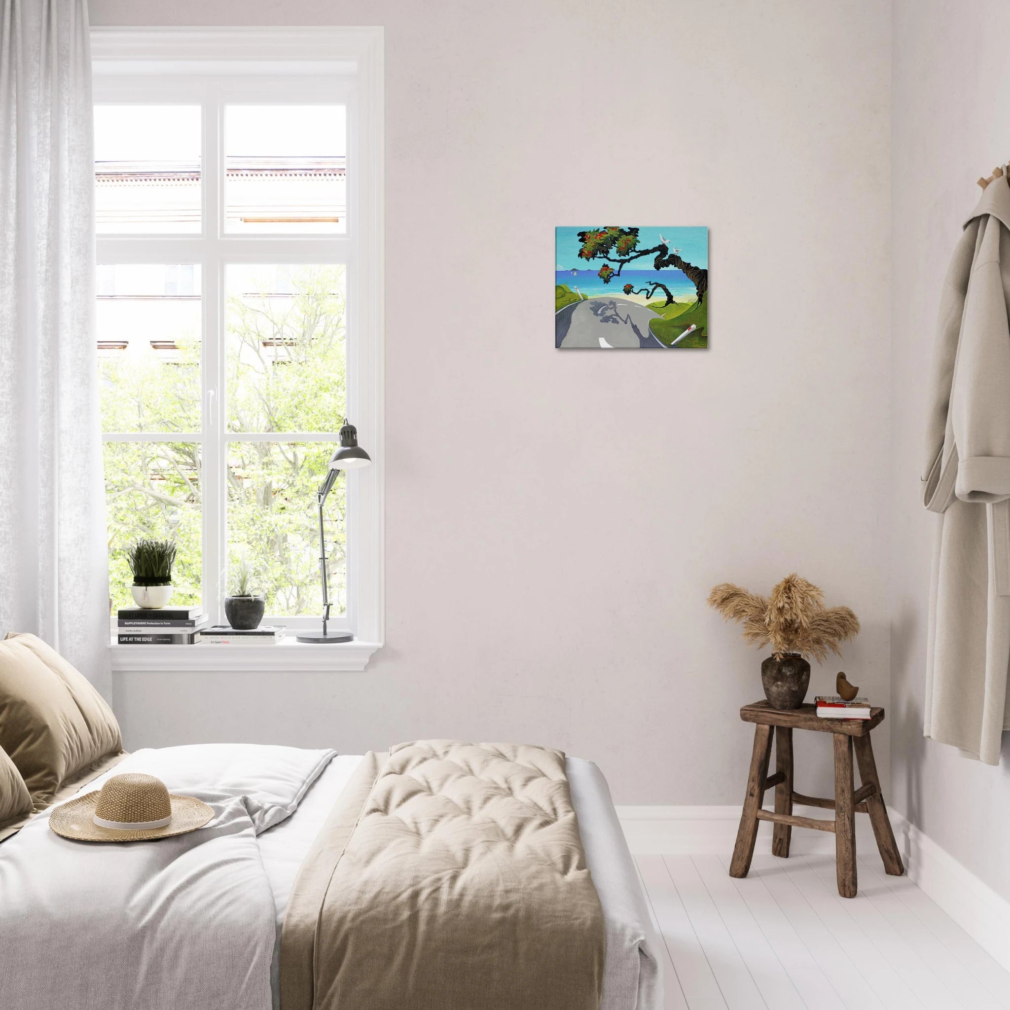 Square canvas print displayed on a white bedroom wall above a stool