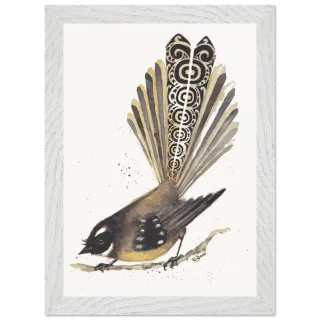 White framed print of a dark pīwakawaka with patterned tail feathers