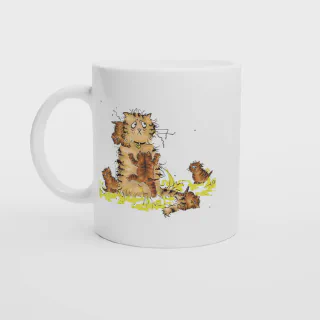 White ceramic mug with orange cat and kittens illustration