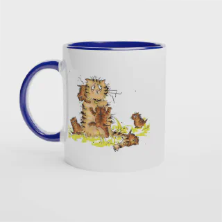White ceramic mug with blue rim, handle and interior and orange cat and kittens illustration
