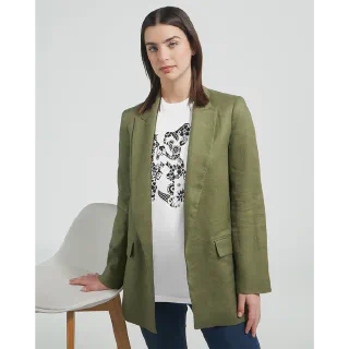 Woman wearing a white t-shirt with French bulldog illustration under a green blazer
