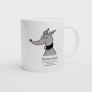 White mug with greyhound head illustration and Elizabeth A. Dodd Arts & Crafts logo