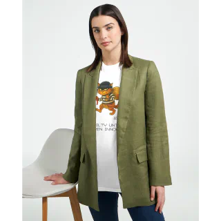 Woman wearing a white T-shirt with cartoon cat burglar under a green blazer