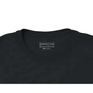 Close-up of the collar label on a black women's crewneck T-shirt